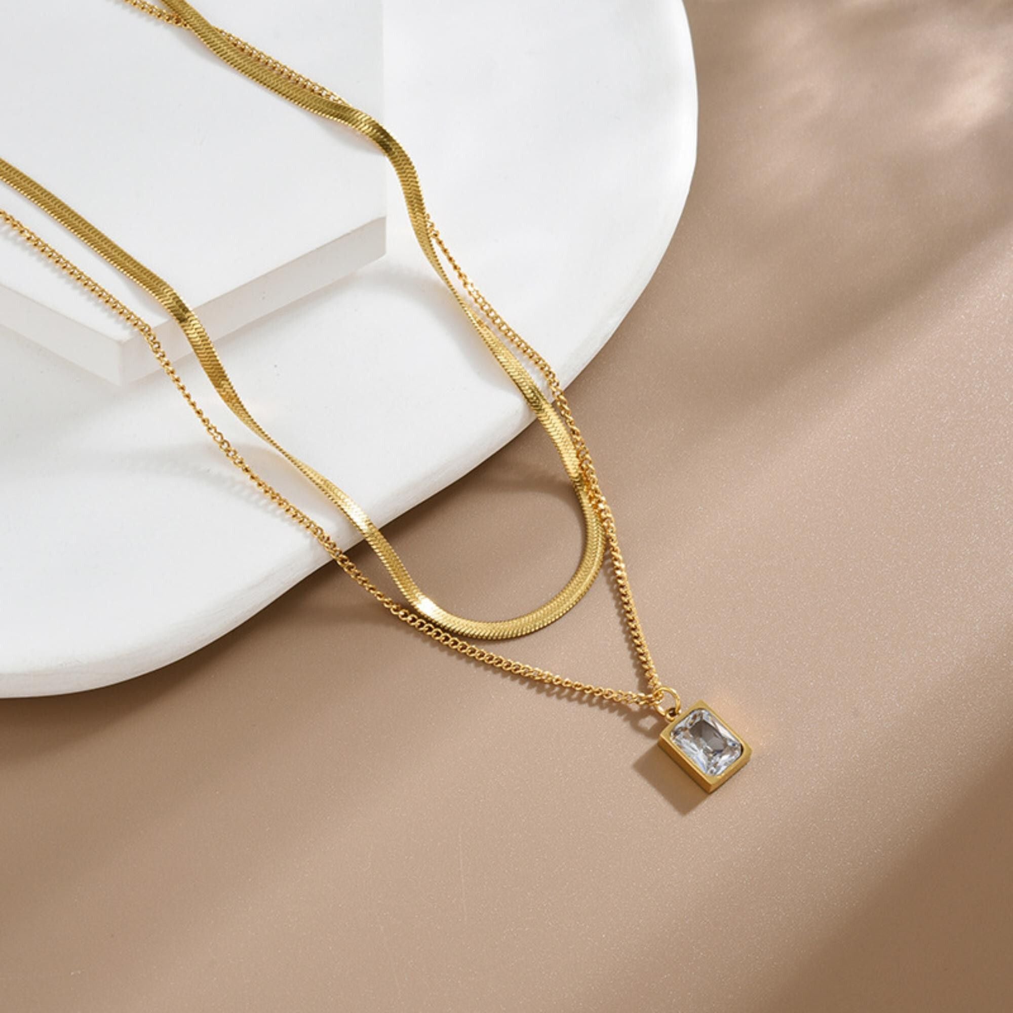 MYKI Esthetic Layered Stainless Steel Necklace (MK796G-WHITE-SSYI)