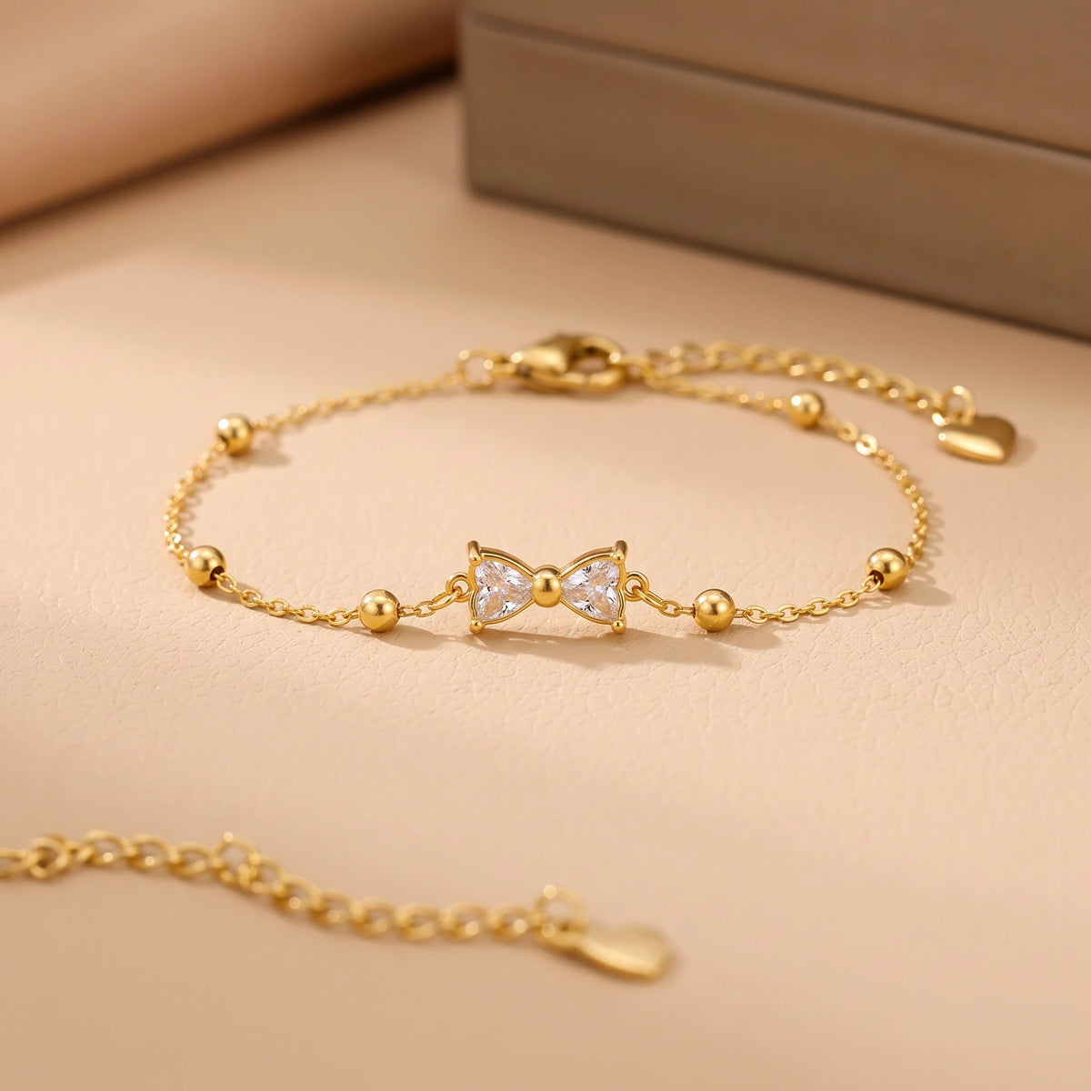 MYKI Gold-Plated Bow Crystal Charm Bracelet(MKBRAD857G-SSYI)