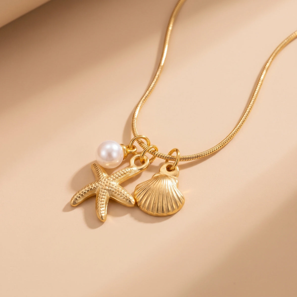 MYKI Anti-Tarnish Starfish & Shell Pendant Gold Necklace (MK919G-SSYI)