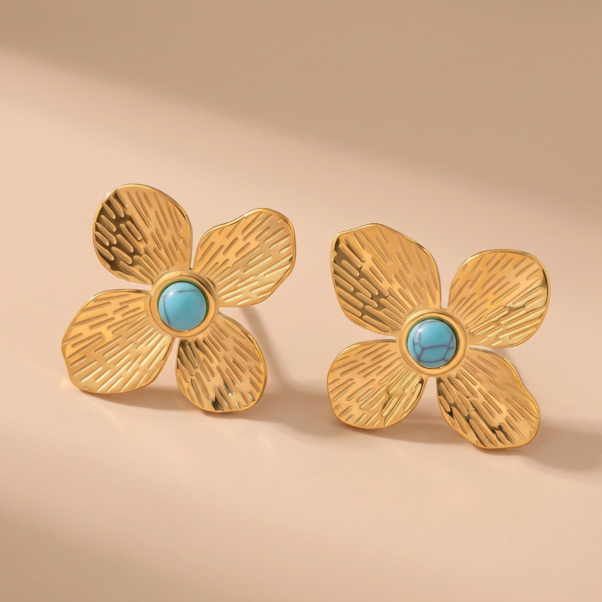 MYKI Gold Plated Blue Stone Floral Anti-Tarnish Stud Earrings (MKERCH935G-SSYI)