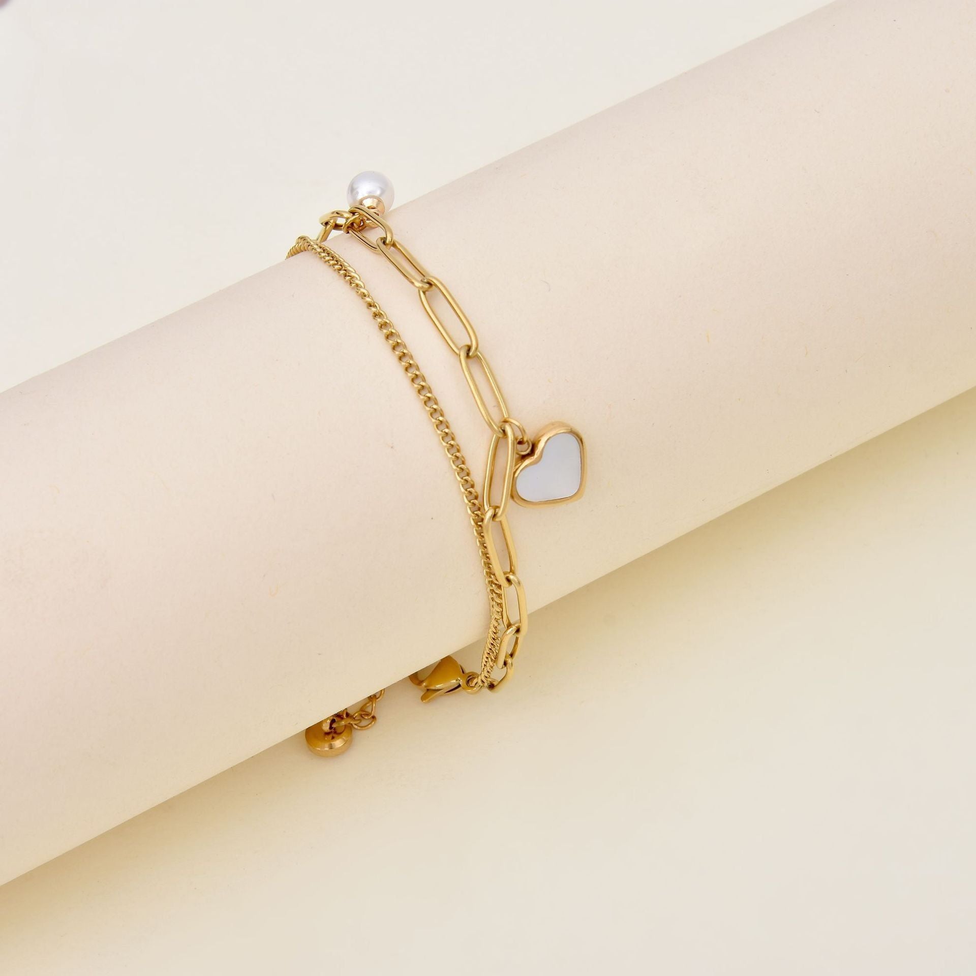 MYKI Multilayered Heart Bracelet  (MKBRAD577-CSS)