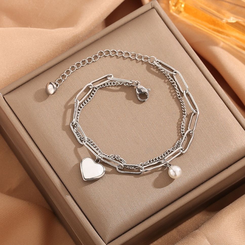 MYKI Multilayered Heart Bracelet  (MKBRAD577-CSS)