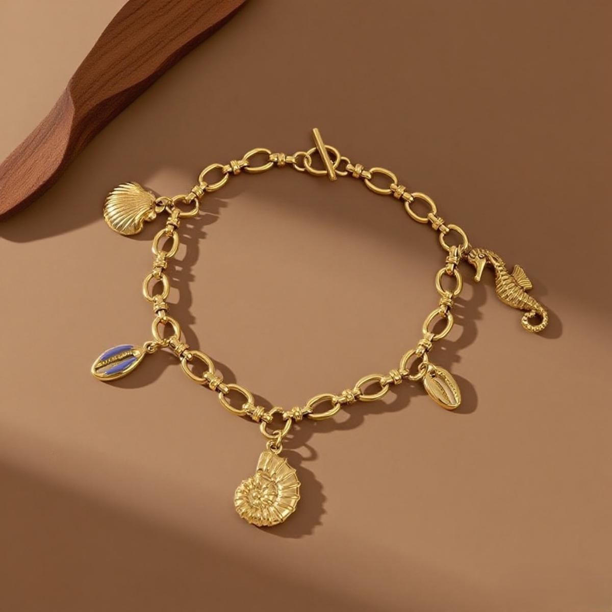 MYKI Gold Plated Sea Charm Bracelet | Shell & Seahorse | Anti-Tarnish(MKBRAD815G-SSYI)