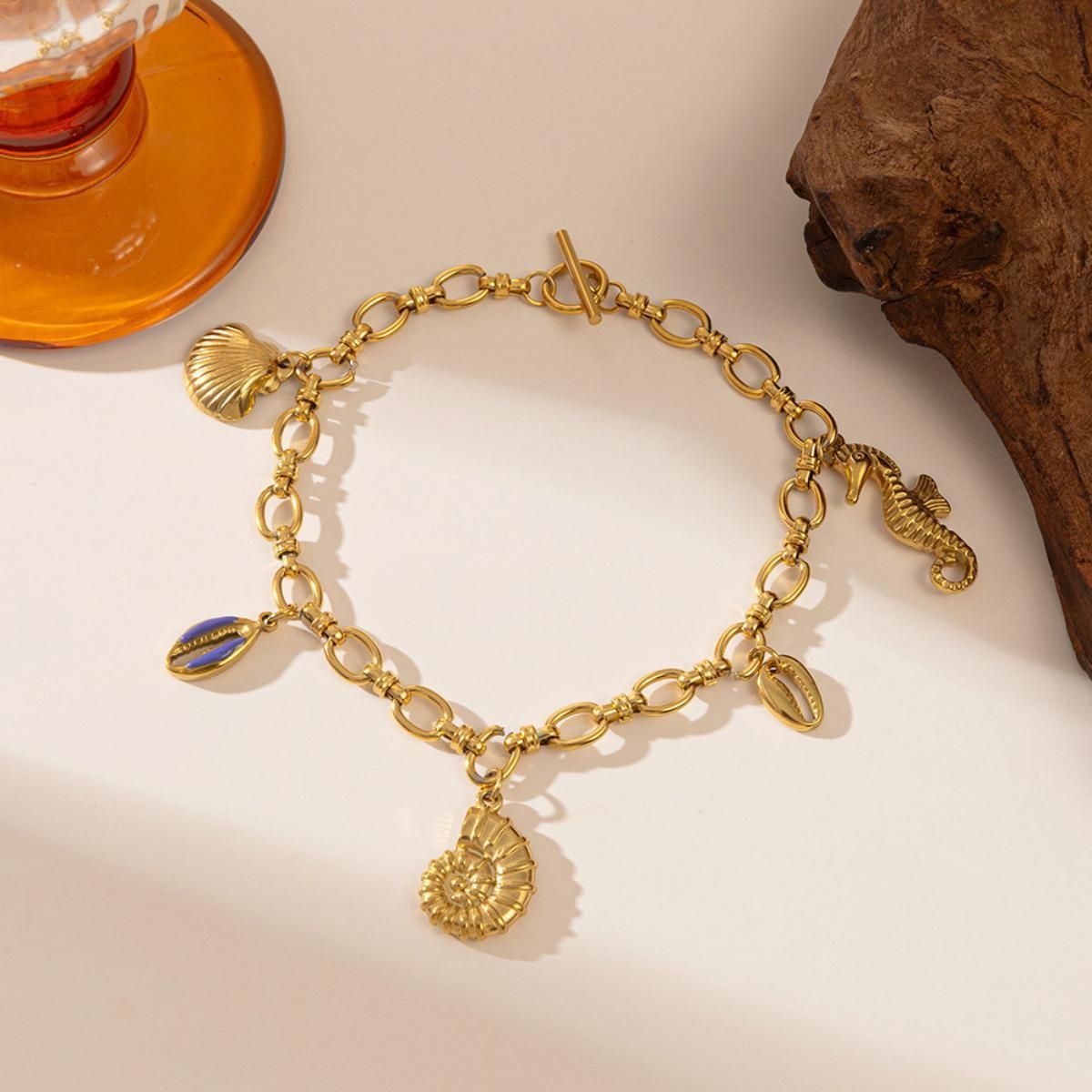 MYKI Gold Plated Sea Charm Bracelet | Shell & Seahorse | Anti-Tarnish(MKBRAD815G-SSYI)