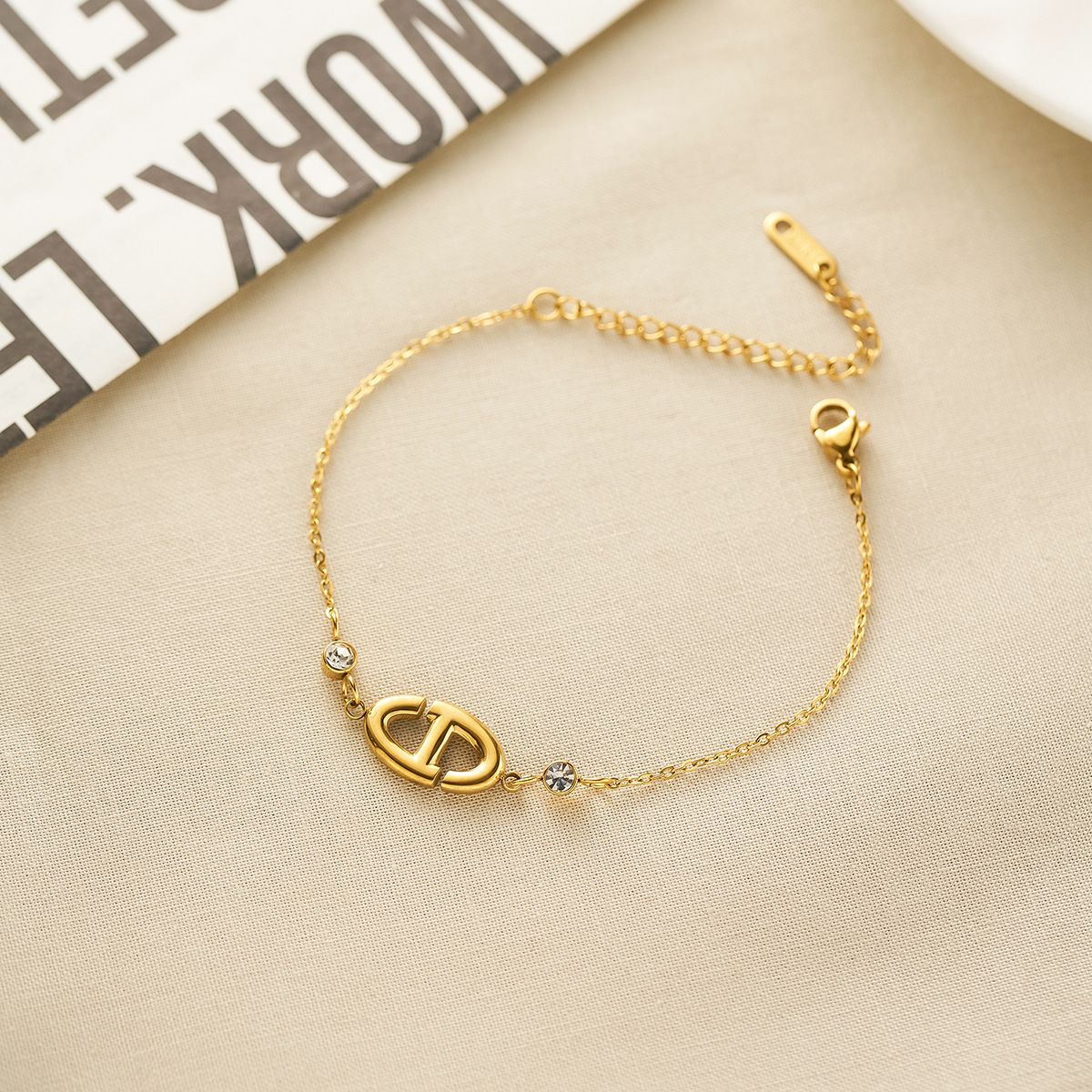 MYKI Gold-Plated Designer-Inspired Logo Bracelet with Crystals – Anti-Tarnish(MKBRAD882G-SSYI)