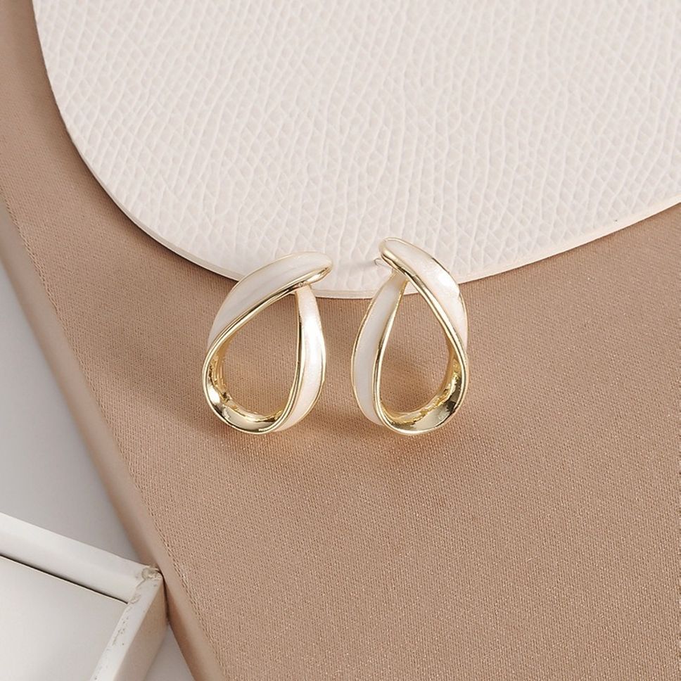 MYKI Ivory Gold Twist Korean Stud Earrings | Minimal Everyday Jewelry (MKERCH849PI-ANT) by MYKI | Korean Fashion Jewelry