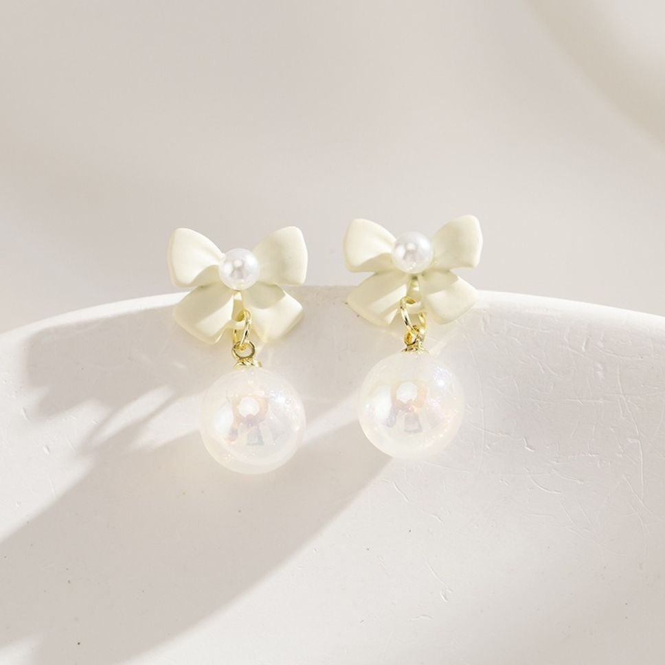 MYKI Bow and Pearl Dangle Korean Earrings (MKERCH919CP-ANT)