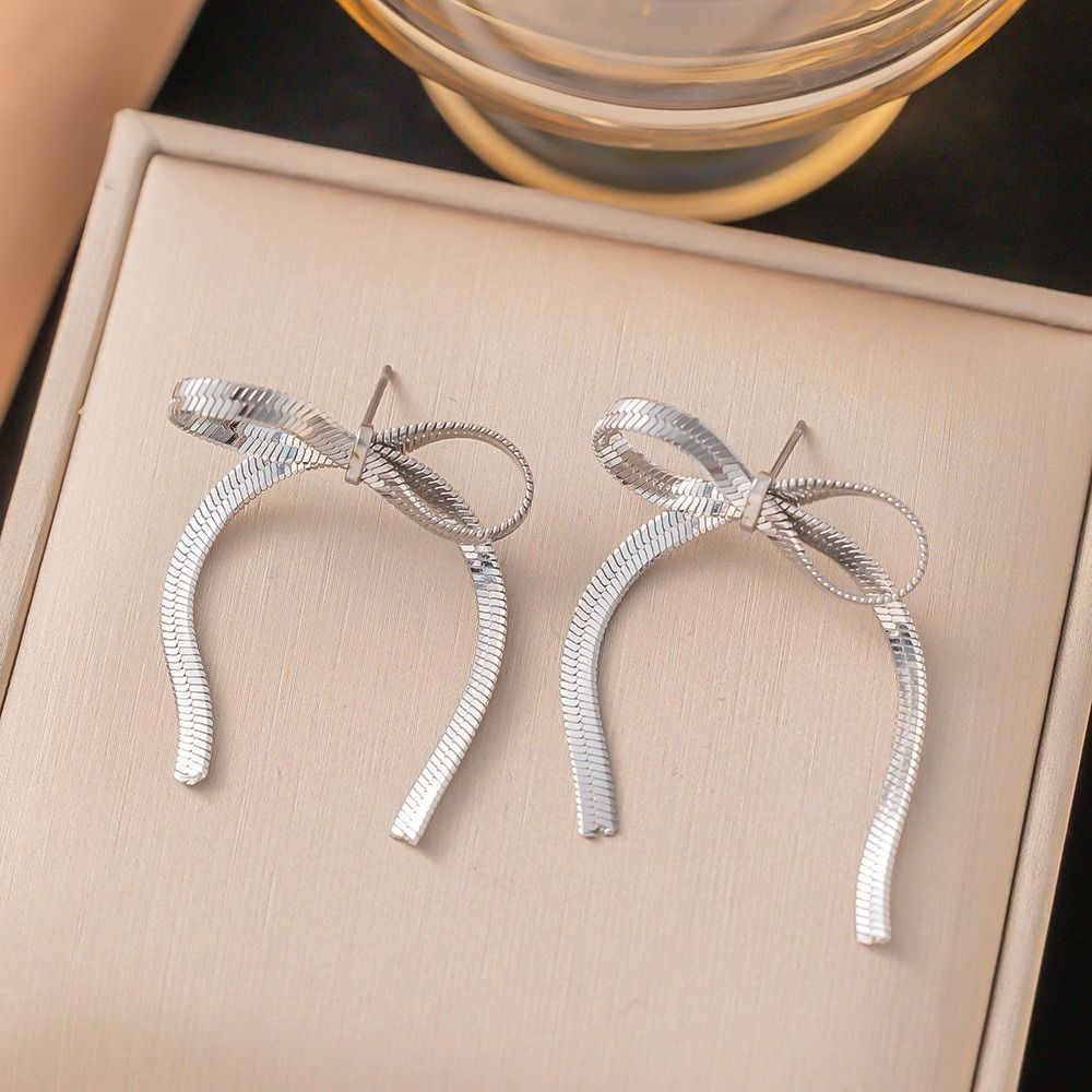MYKI Silver Ribbon Bow Dangle Earrings | Anti Tarnish (MKERCH995S-SSYI)