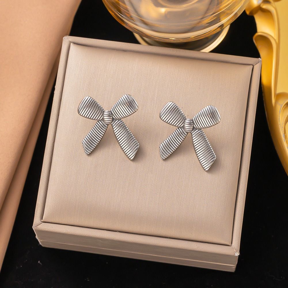 MYKI Silver Bow Knot Stud Earrings | Anti Tarnish (MKERCH997S-SSYI)
