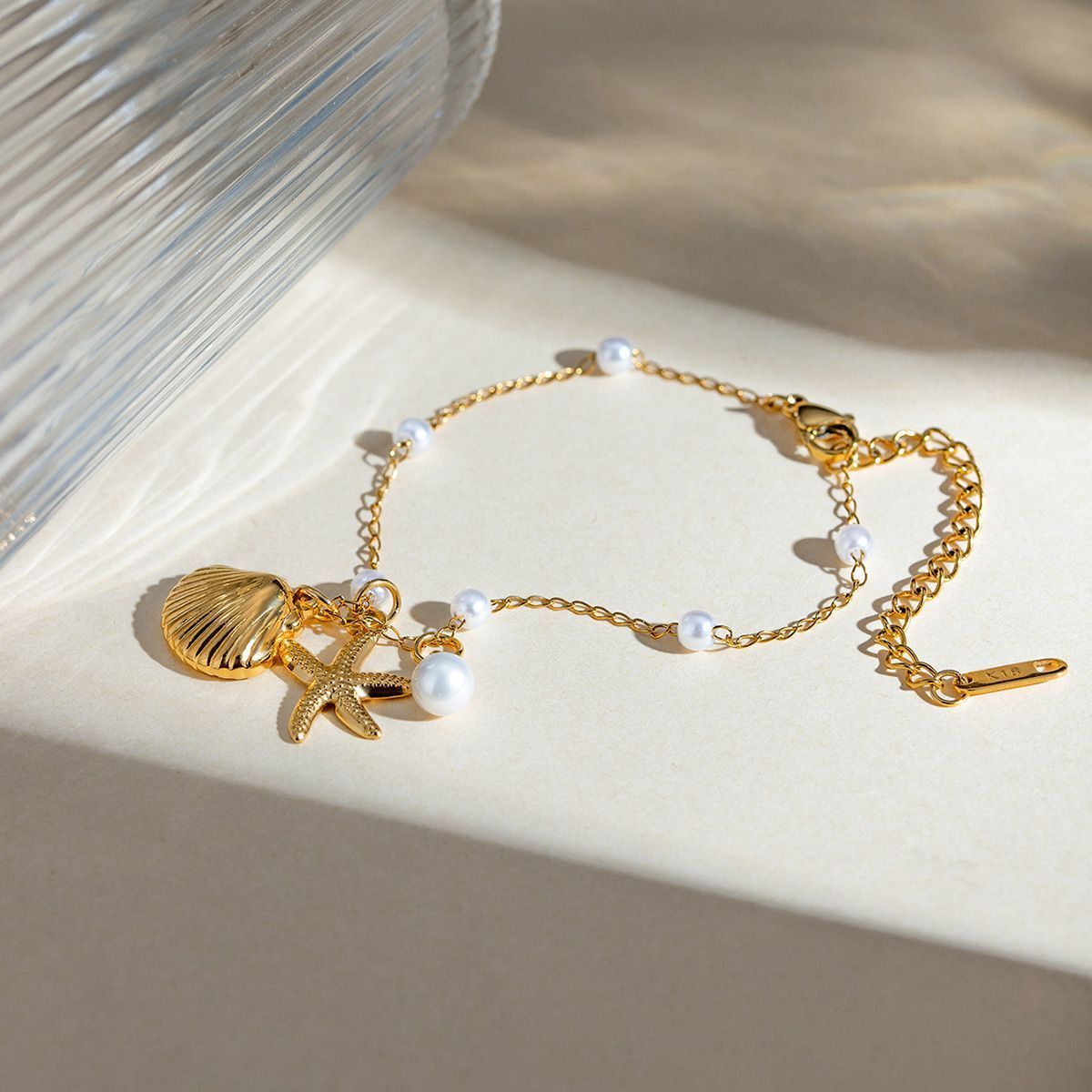 MYKI Starfish & Shell Charm Beach Style Anklet for Women – Gold Color Premium Plated (MKANK730G-SSYI)