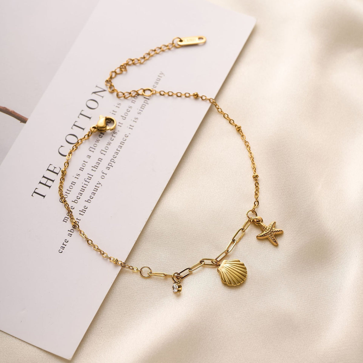MYKI Starfish Shell & Crystal Dangling Charm Anklet for Women – Gold Color Premium Plated (MKANK737G-SSYI)