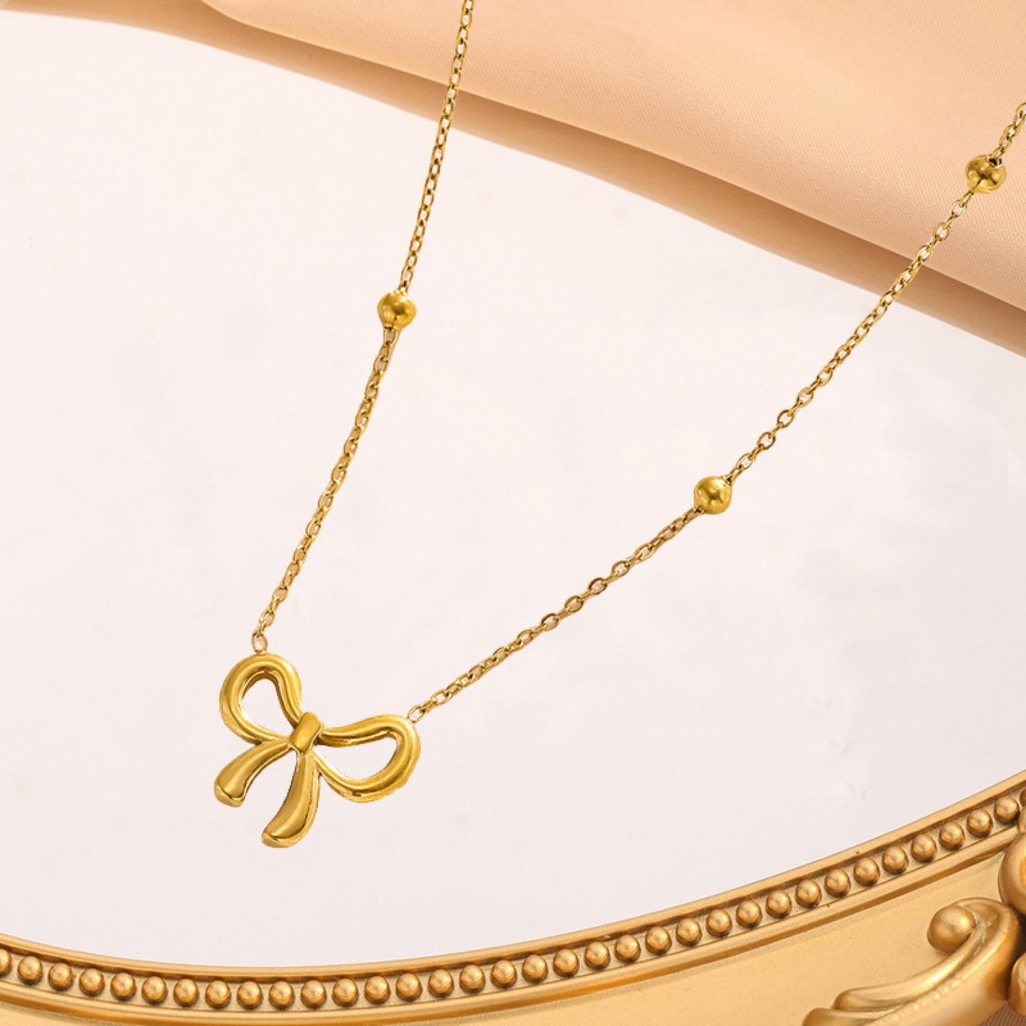 MYKI Anti-Tarnish Gold Plated Bow Pendant Chain (MK705G-SSYI)