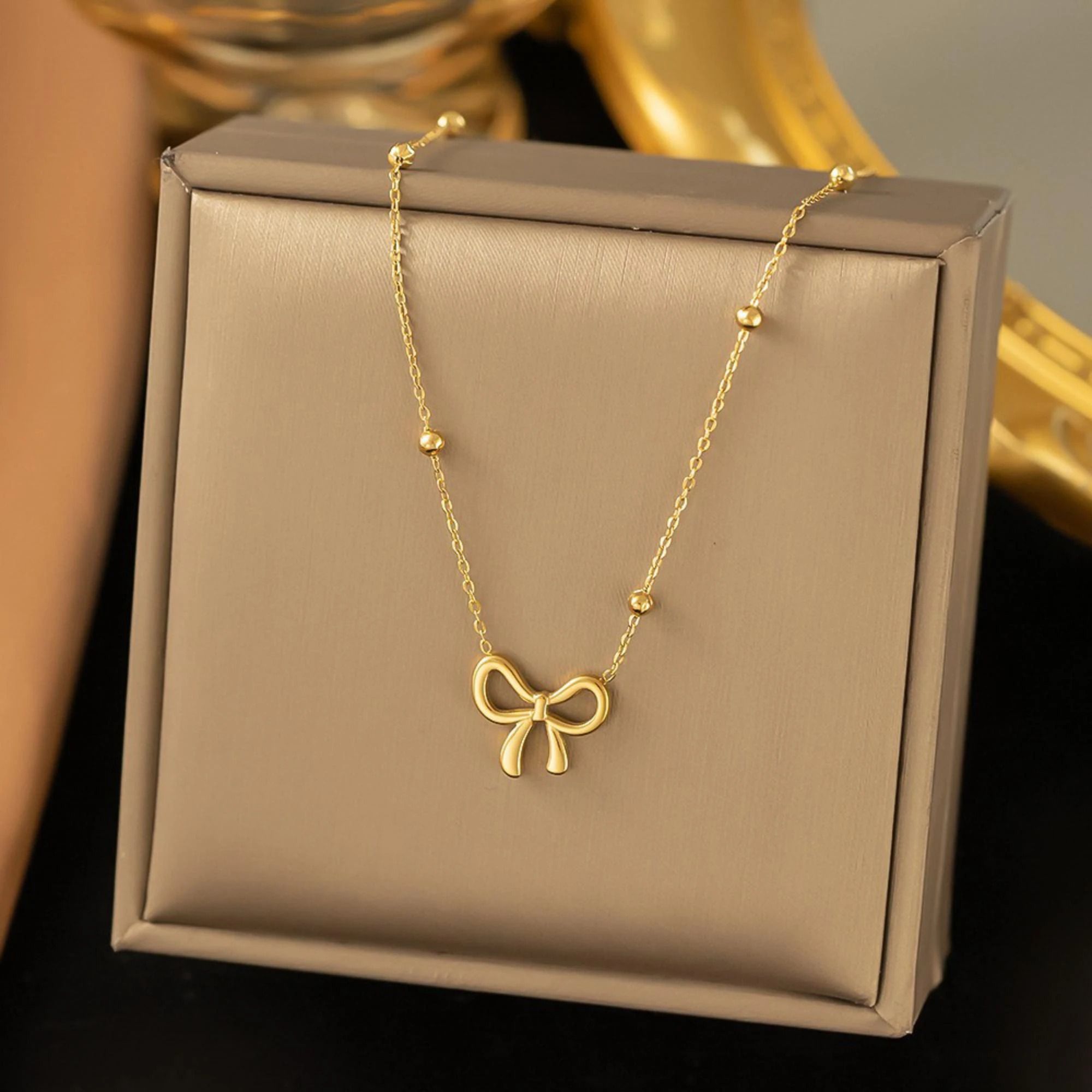 MYKI Anti-Tarnish Gold Plated Bow Pendant Chain (MK705G-SSYI)