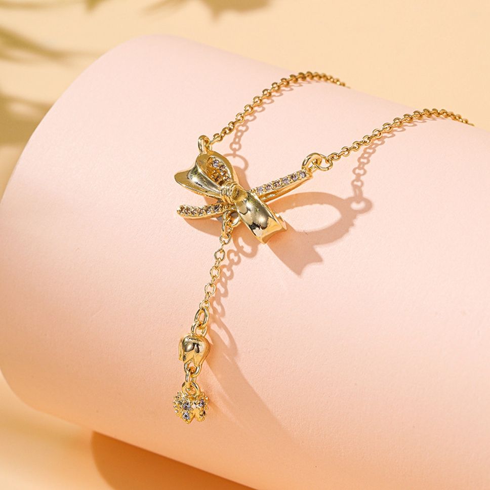 MYKI Elegant Bow Pendant Necklace with Dangling Charm (MK877-SSYI)