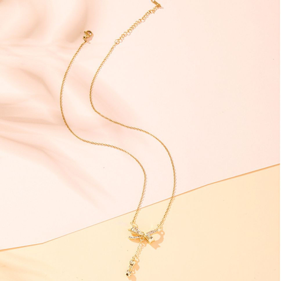 MYKI Elegant Bow Pendant Necklace with Dangling Charm (MK877-SSYI)