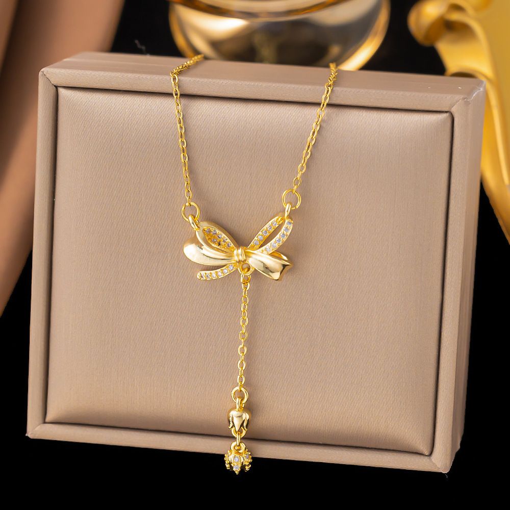 MYKI Elegant Bow Pendant Necklace with Dangling Charm (MK877G-SSYI)