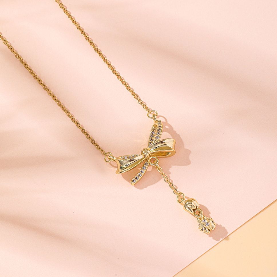 MYKI Elegant Bow Pendant Necklace with Dangling Charm (MK877-SSYI)