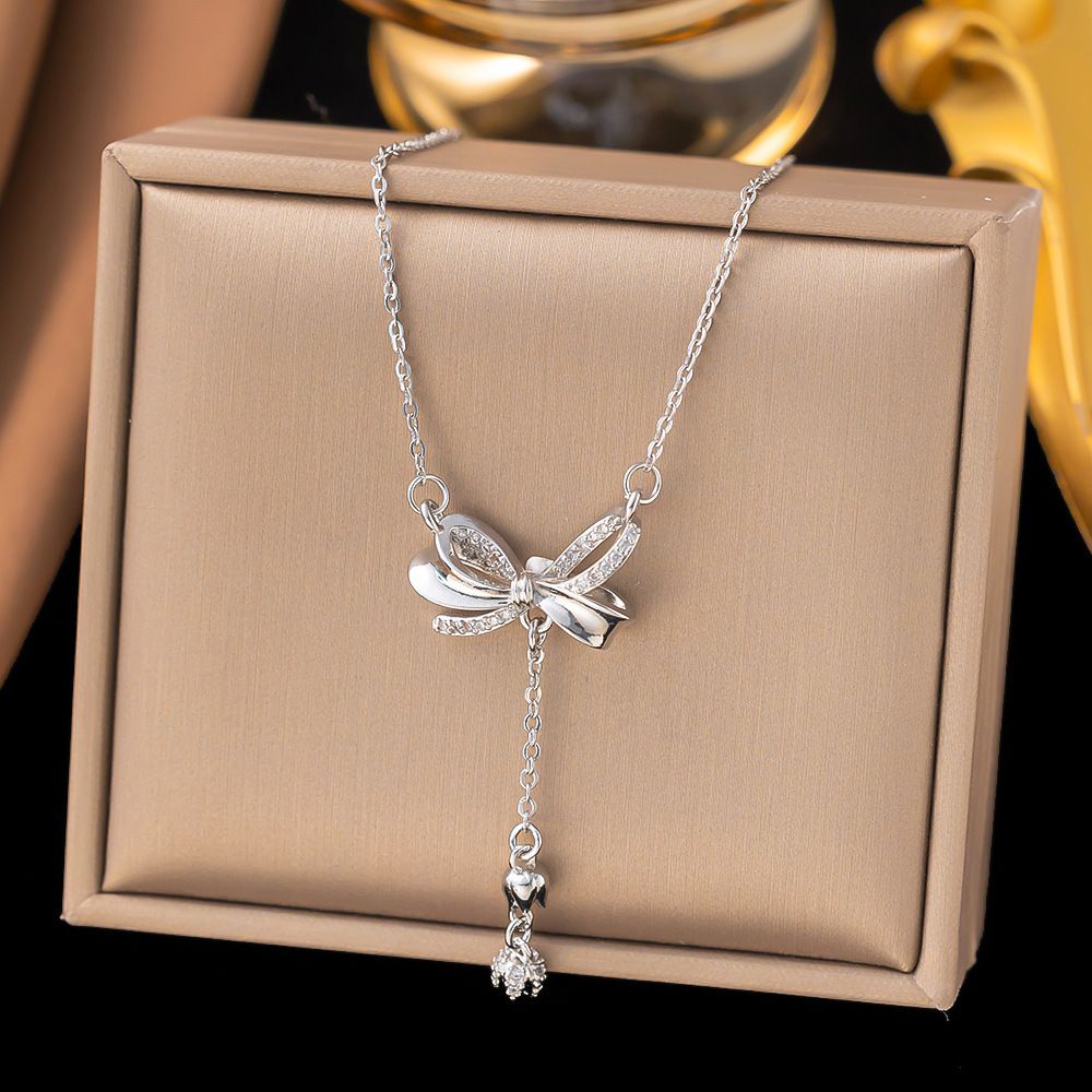 MYKI Elegant Bow Pendant Necklace with Dangling Charm (MK877S-SSYI)