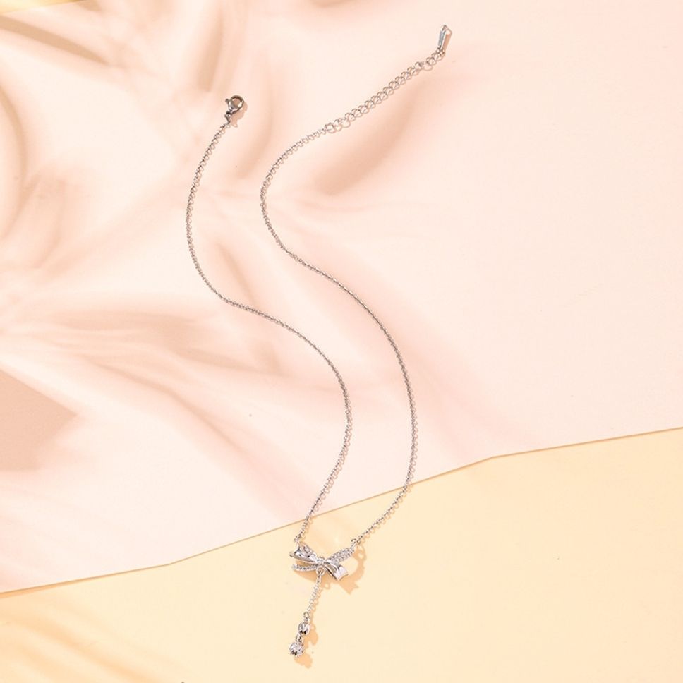 MYKI Elegant Bow Pendant Necklace with Dangling Charm (MK877-SSYI)