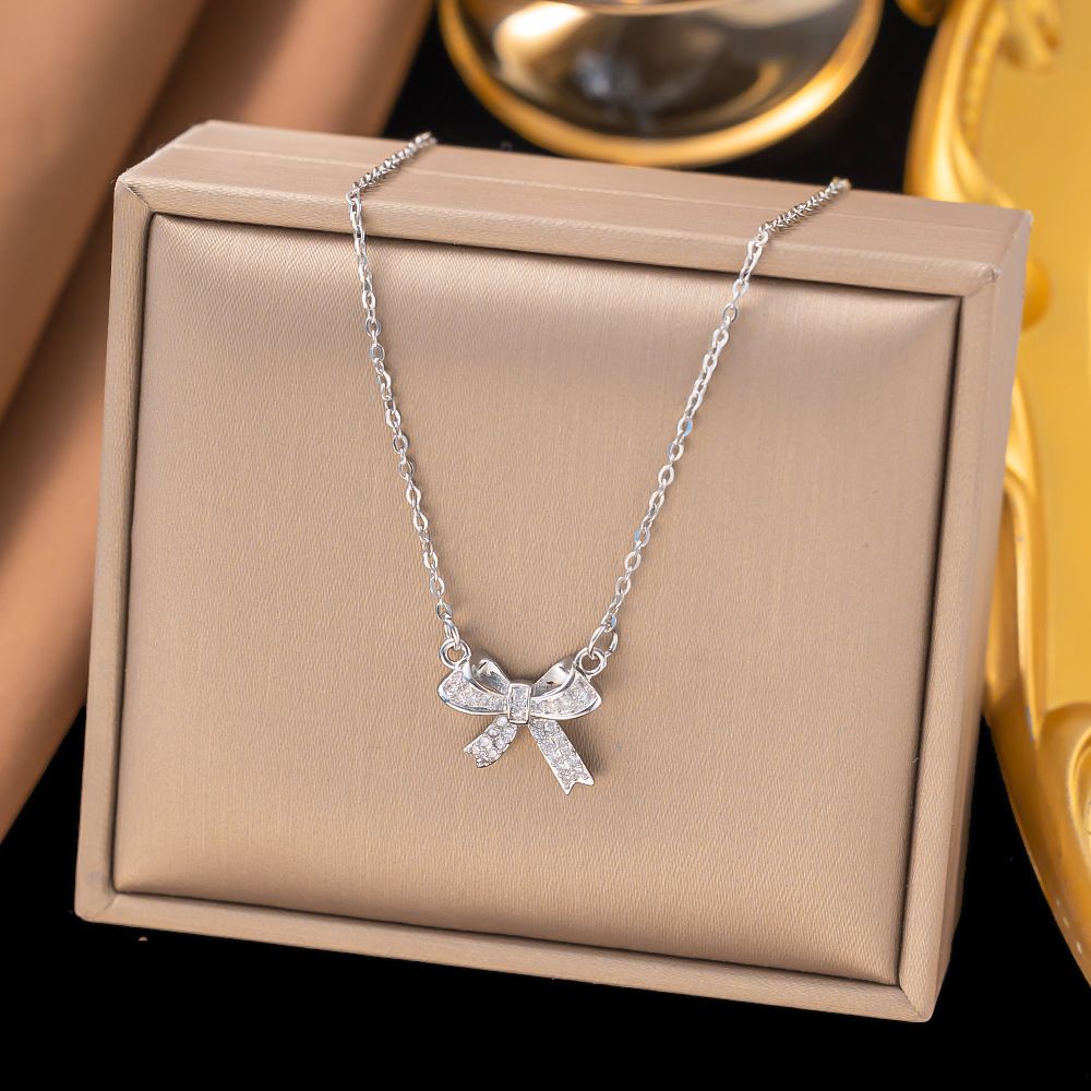 MYKI Silver-Plated Mini Bow Pendant Necklace (MK882S-SSYI)