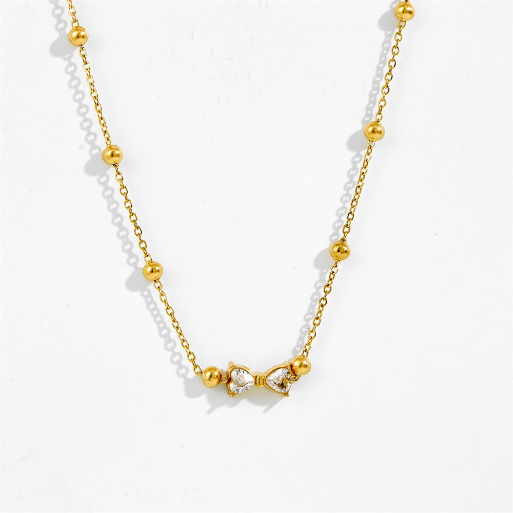 MYKI Anti-Tarnish Bow Crystal Pendant Necklace (MK953G-SSYI)