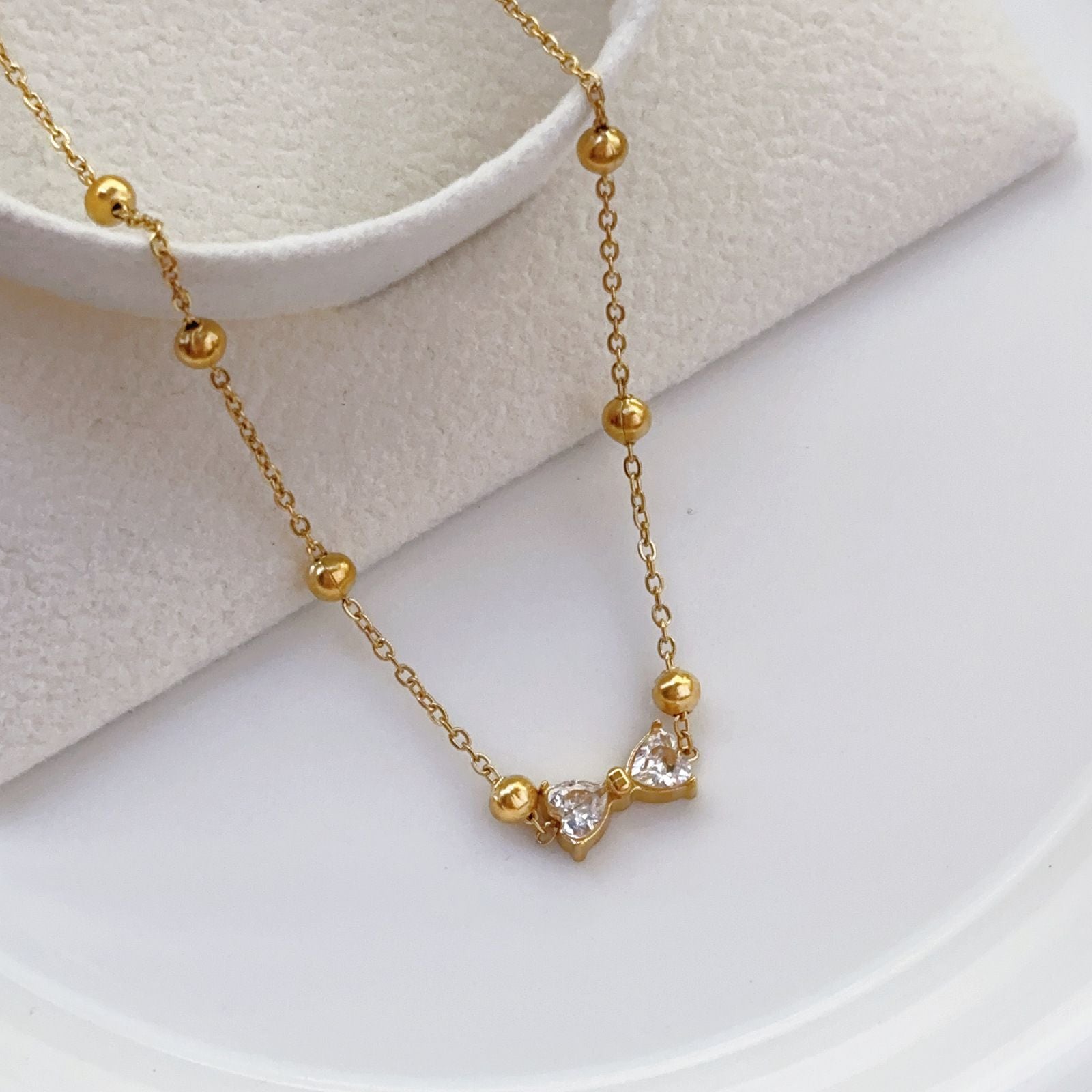 MYKI Anti-Tarnish Bow Crystal Pendant Necklace (MK953G-SSYI)