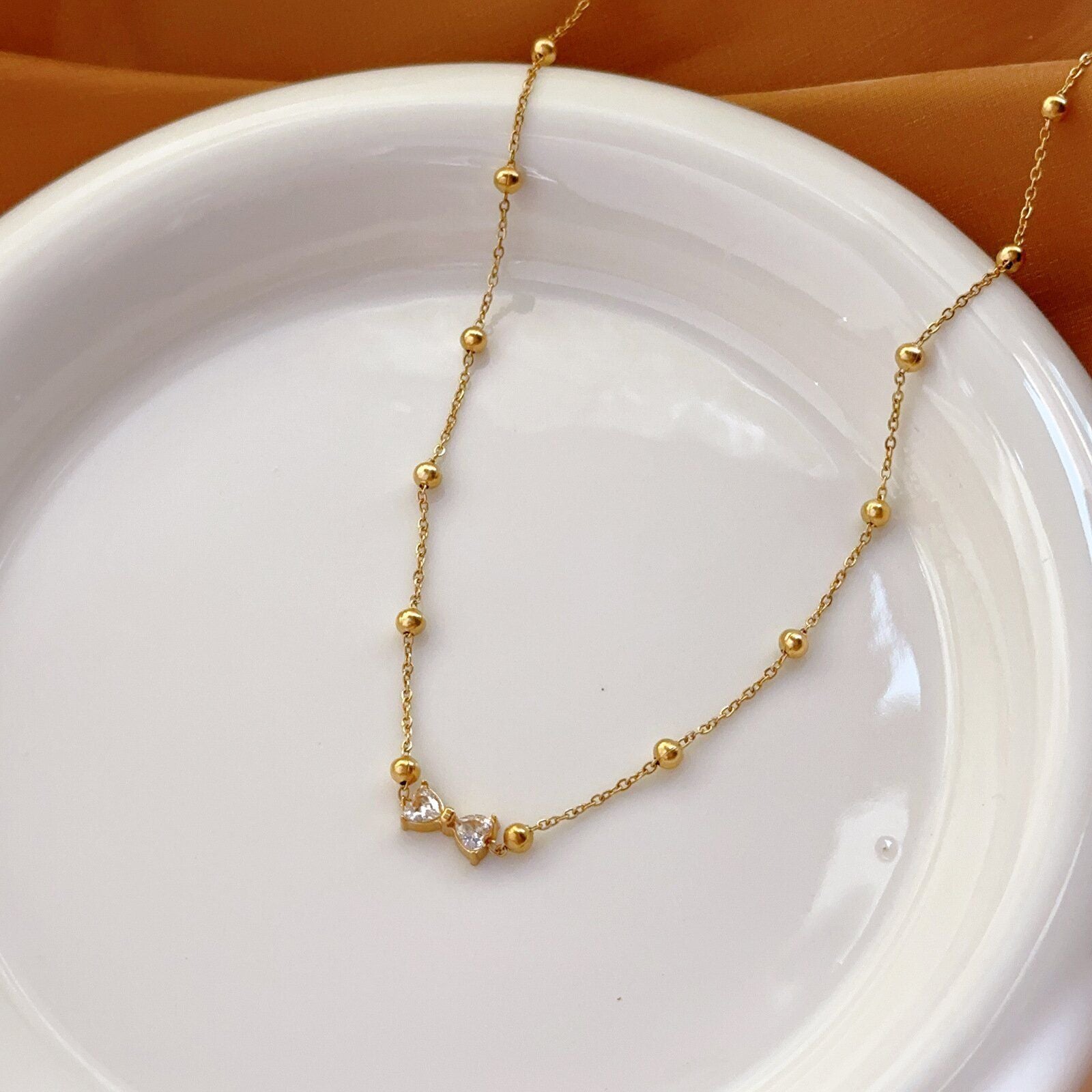 MYKI Anti-Tarnish Bow Crystal Pendant Necklace (MK953G-SSYI)
