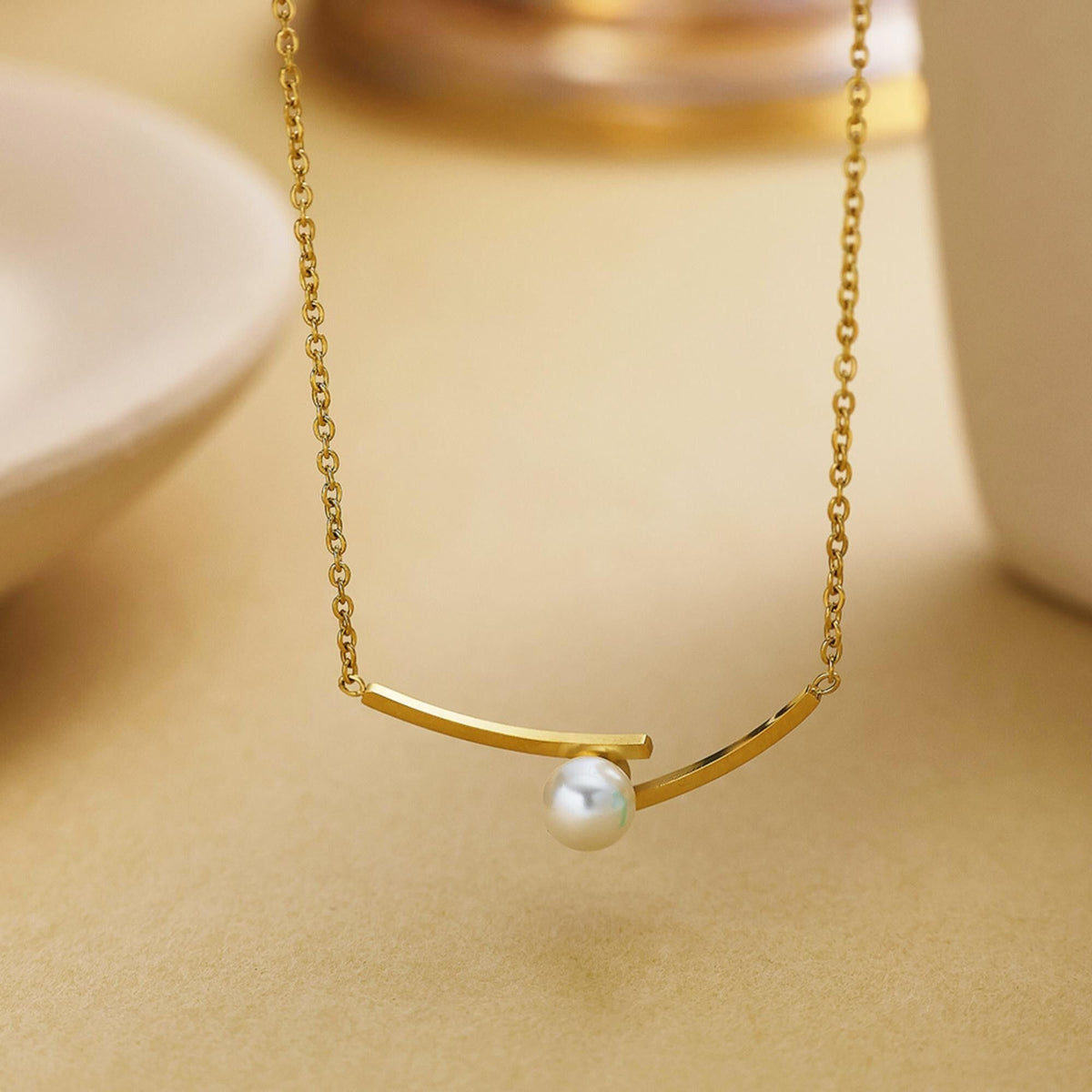 MYKI Anti-Tarnish Stainless Steel Gold Plated Pearl Accent Bar Necklace (MK791G-SSYI)