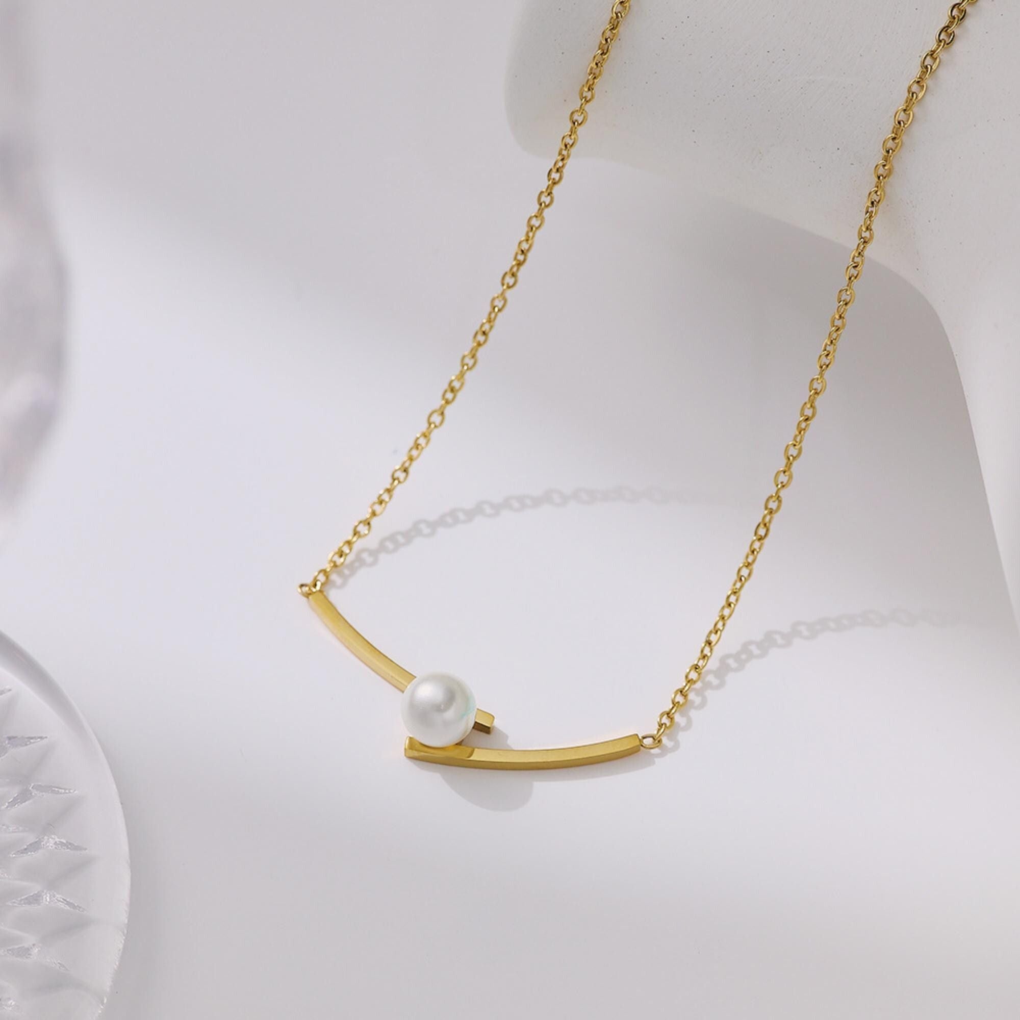 MYKI Anti-Tarnish Stainless Steel Gold Plated Pearl Accent Bar Necklace (MK791G-SSYI)