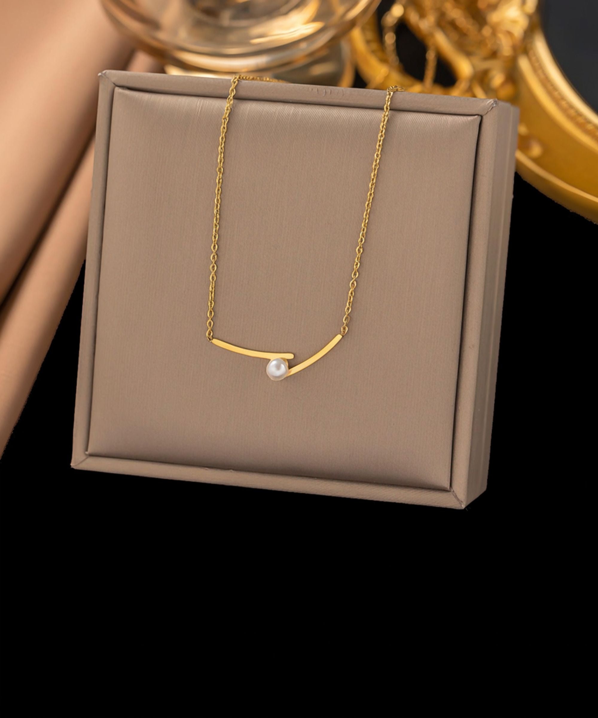 MYKI Anti-Tarnish Stainless Steel Gold Plated Pearl Accent Bar Necklace (MK791G-SSYI)