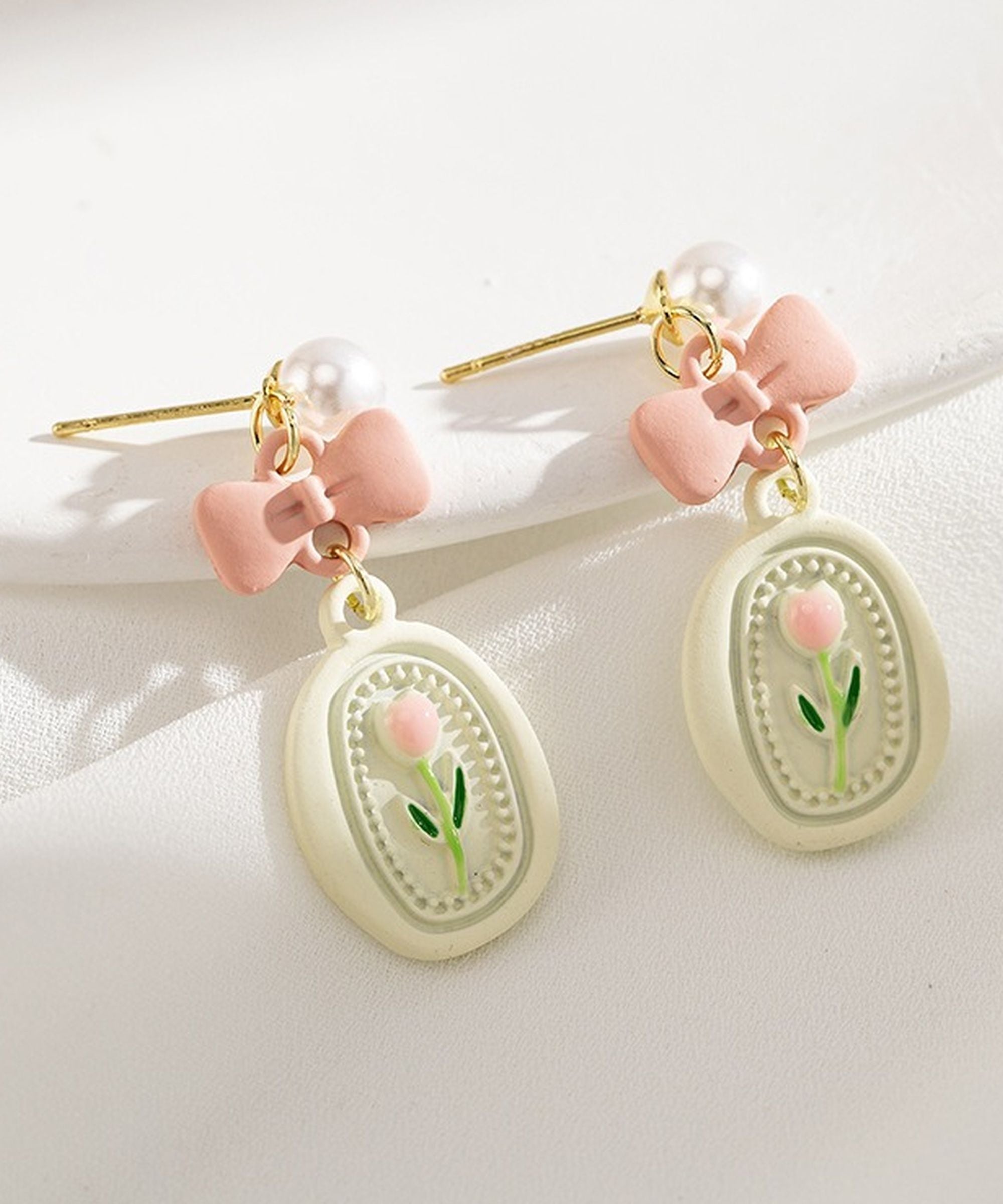 MYKI Pastel Pink Floral Bow Korean Earrings | Pearl Stud Design (MKERCH832PI-ANT) by MYKI | Korean Fashion Jewelry